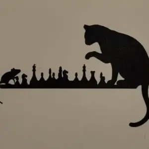 Cat and mouse playing chess