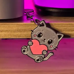Cat keychain with a heart
