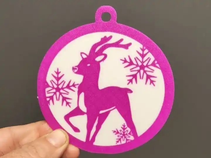 Christmas ball with reindeer and stars ornament