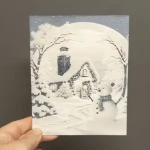 Snowman and house christmas ornament