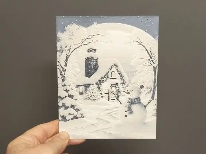 Snowman and house christmas ornament
