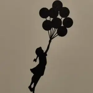 Girl with balloons wall art