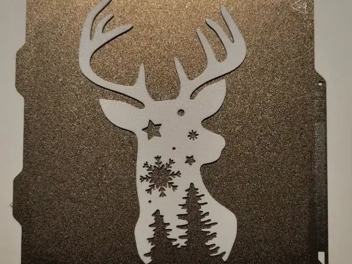 Reindeer with stars and christmas trees